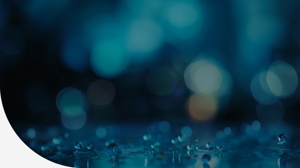 Abstrakt mönster i blåa toner med bubblor och regndroppar.