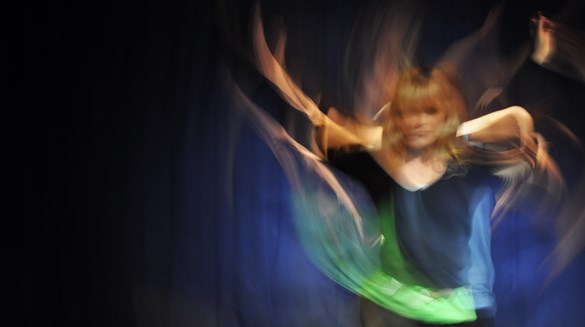 A person is seen dancing in a blur